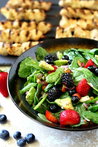 Get ready to shake up your summer cookout with this sweet, colorful and oh-so-sassy easy-to-make bright triple berry almond spinach salad! (vegan, dairy and gluten free)