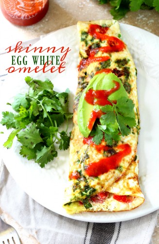 Uber healthy, totally delicious and probably the easiest thing you’ll ever make in your kitchen, this Skinny Egg White Omelet with spinach and tomato is where it's at if you're looking to get lean.