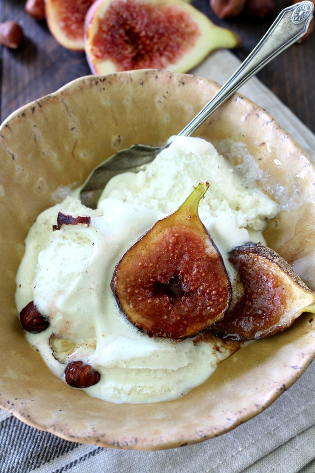 Spiced Roasted Figs Over Vanilla Ice Cream- luscious, creamy vanilla ice cream joined with caramelized, spiced figs and toasted hazelnuts will have your tastebuds dancing in delight!