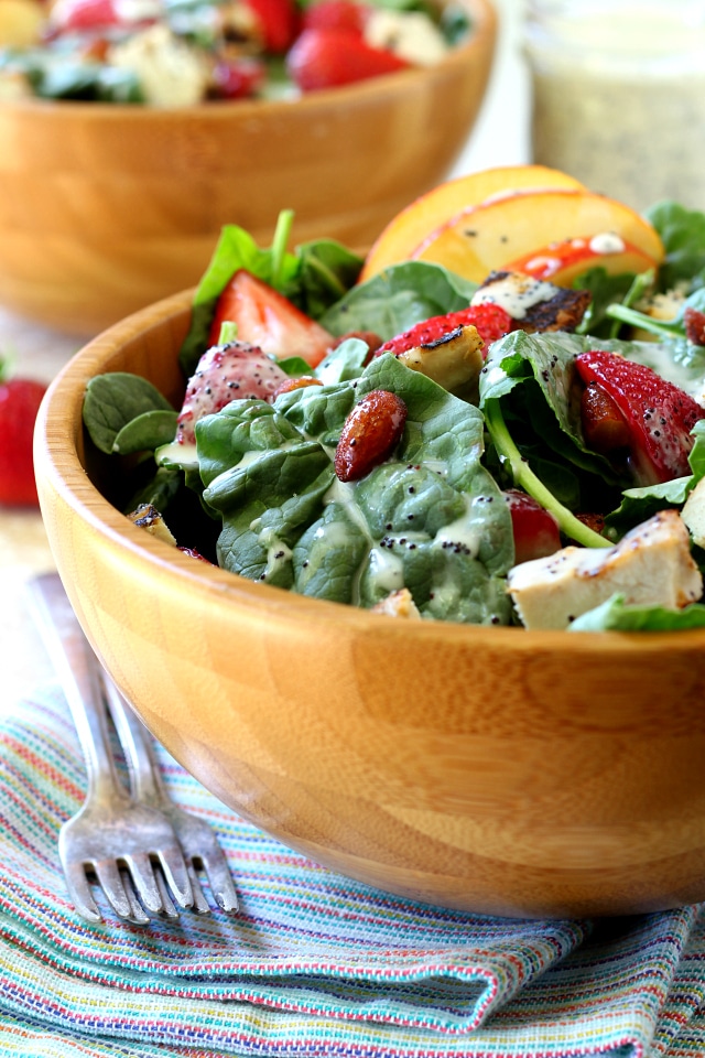 A quick and tasty Strawberry Apple Chicken Salad, filled with plump juicy strawberries, sweet apple slices, crunchy almonds and topped off with the most wonderful poppy seed dressing you've ever tasted!