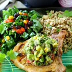 This recipe for Cilantro Lime Grilled Pork Chops With Southwestern Guacamole is beyond flavorful and so EASY to make too! The pork chops cook up in less than 10 minutes on the grill and come out super juicy and incredibly tasty.
