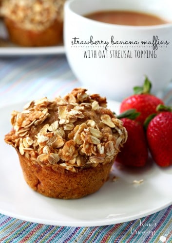Strawberry Banana Whole Grain Muffins filled with juicy strawberries and covered with a sweet oat streusel topping! These muffins are a MUST make!