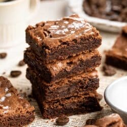 Stacked espresso brownies topped with sea salt.