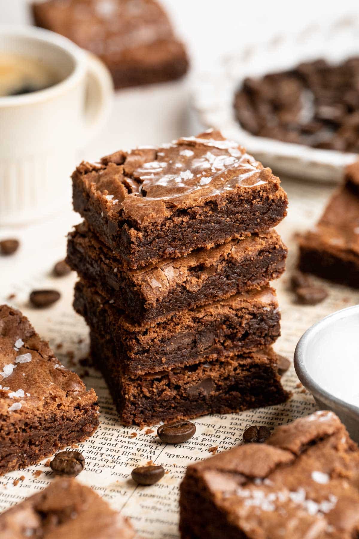 Stacked espresso brownies topped with sea salt.
