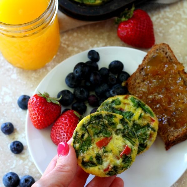 Spinach Ham Egg Muffins with lean ham, spinach and bell pepper are so flavorful, uber healthy, gluten free, dairy free and paleo. They're the perfect on-the-go breakfast and even kid-friendly!