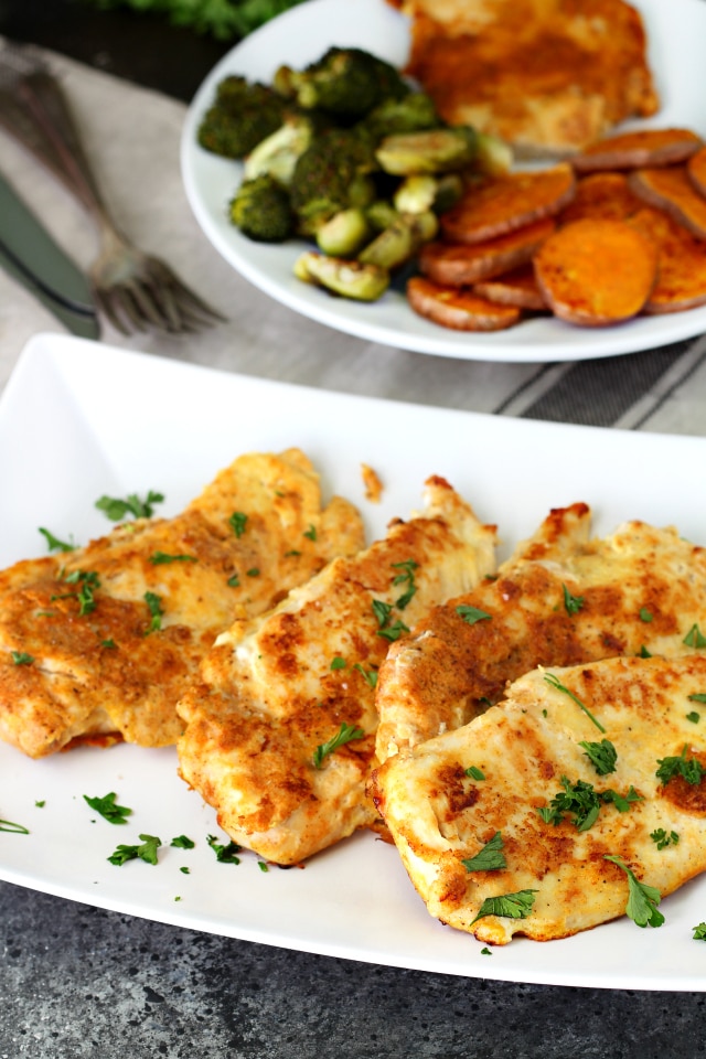 Best Ever Paleo Pan Fried Chicken- No more boring bird! Thin chicken cutlets breaded in a flavorful coconut flour seasoning mix and pan fried to perfection results in a crowd-pleasing chicken meal even the kiddos will love!