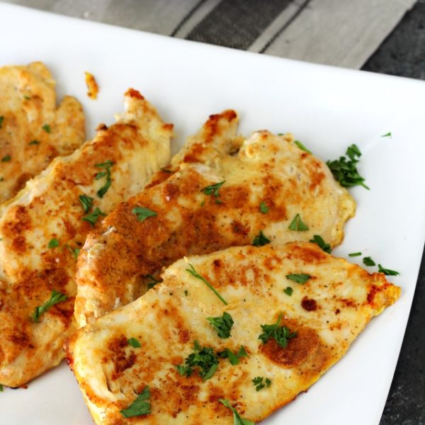 Best Ever Paleo Pan Fried Chicken- No more boring bird! Thin chicken cutlets breaded in a flavorful coconut flour seasoning mix and pan fried to perfection results in a crowd-pleasing chicken meal even the kiddos will love!