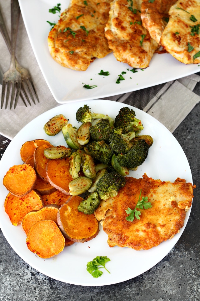 Best Ever Paleo Pan Fried Chicken- No more boring bird! Thin chicken cutlets breaded in a flavorful coconut flour seasoning mix and pan fried to perfection results in a crowd-pleasing chicken meal even the kiddos will love!