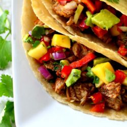 Slow Cooker Carnitas with Mango Avocado Salsa- a simple, tasty recipe for making tender, juicy, perfectly cooked carnitas in your slow cooker!