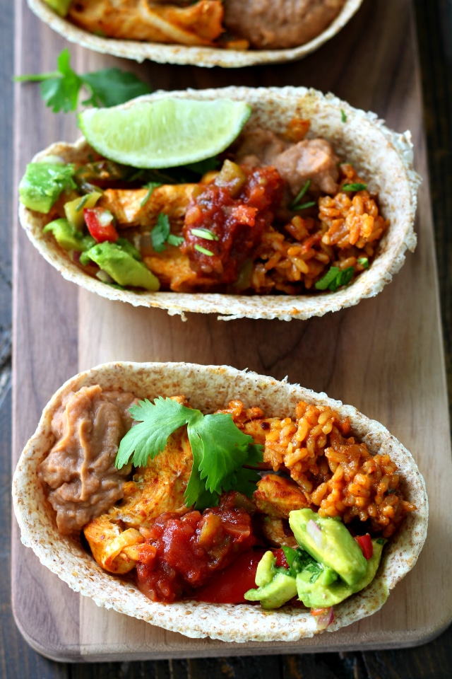 Flavorful Easy Chicken Fajita Burrito Bowls ready in less than 30 minutes for a fabulous gameday meal or weeknight dinner!