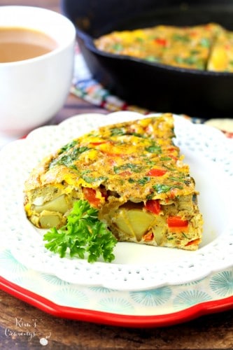is Festive Holiday Frittata with creamy Yukon Gold Potatoes and zingy sweet red pepper is soon to be the hit of your holiday brunch! (Vegetarian, Dairy-Free and Gluten-Free)