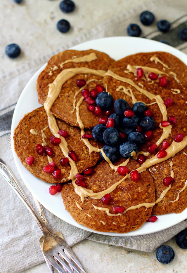 These flourless gingerbread waffles or pancakes are like your favorite Christmas cookies, but in breakfast form. (#YAY) They're sweetened with molasses, generously spiced with ginger and cinnamon, oil and refined sugar-free and naturally gluten-free dairy-free.