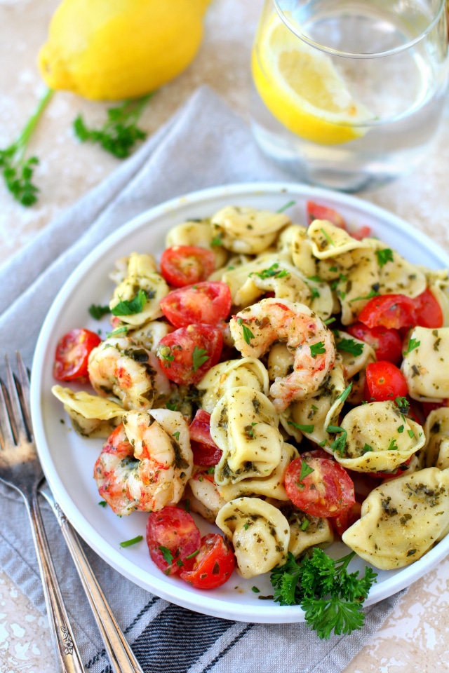 Wholesome and delicious Easy Pesto Shrimp Tortellini Salad made simply with basil pesto, tasty tortellini, roasted tomatoes and quick-cooking shrimp. Just 4 main ingredients in only 20 minutes - the perfect quick + easy dinner!