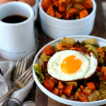 Breakfast Hash with Sweet Potato, Brussels Sprouts, Apple and topped with a Fried Egg is the perfect addition to your brunch, but also works so well as breakfast for dinner!