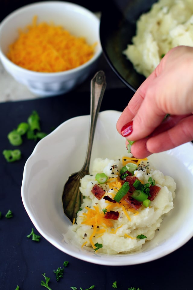 The traditional comfort dish is transformed into game day fun with this yummy mashed potato bar!