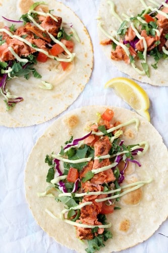 Seared Salmon Tacos with Avocado Crema are the perfect twist on the original fish taco recipe!