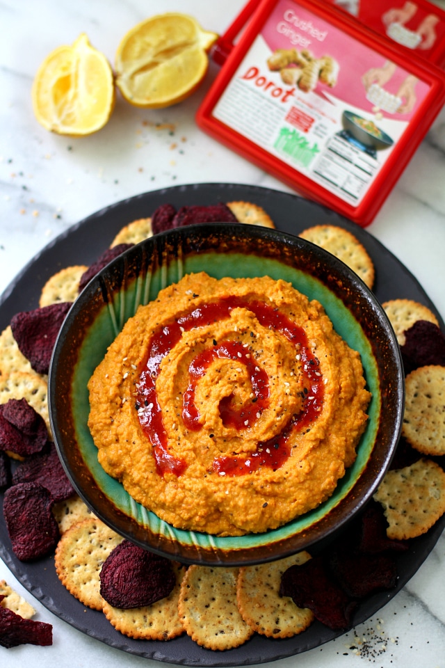 The perfect marriage of sweet and spicy - this Zesty Carrot Ginger Hummus is the perfect appetizer to ring in spring time snackin'!