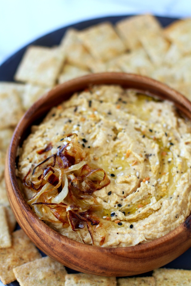 You may never want to buy store bought hummus again. This Flavorful Caramelized Onion Hummus is irresistible!
