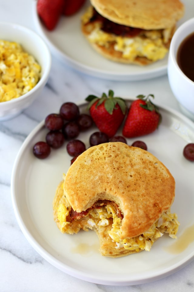 Rise and shine, lovelies, we're cooking up the ultimate of breakfast sandwiches! You guys are going to go crazy for these Bacon Egg Pancake Breakfast Sandwiches!
