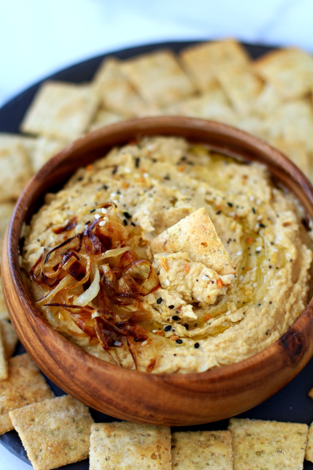 Roasted Grape Caramelized Onion Hummus Crostini - This appetizer is bursting with flavor and is a crowd-pleaser at any event! {vegan & gluten-free}