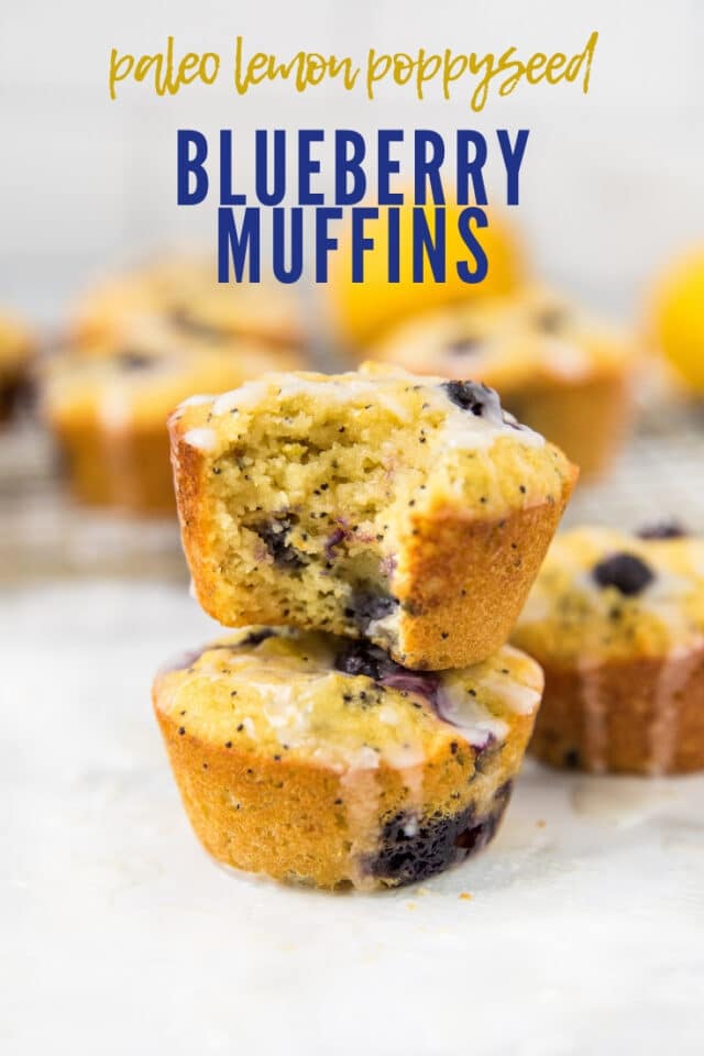2 blueberry muffins stacked with other muffins in the background