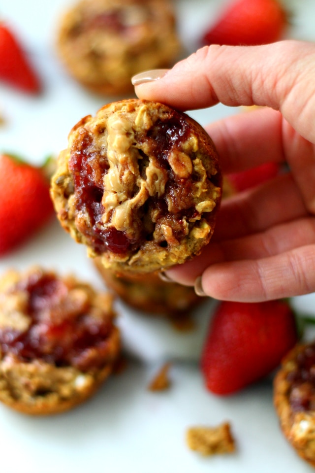 Topped with fruit spread and peanut butter swirls, these Gluten-Free Peanut Butter and Jelly Muffins are so soft, tender and scrumptious!