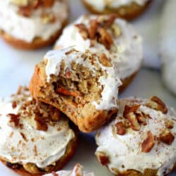 Paleo Carrot Cake Cupcakes with one bite taken out