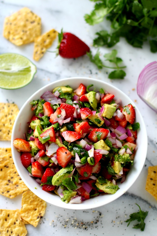 Easy Strawberry Avocado Salsa Recipe makes a delicious fruity appetizer, snack, or even served as a topping for chicken, fish or salads.