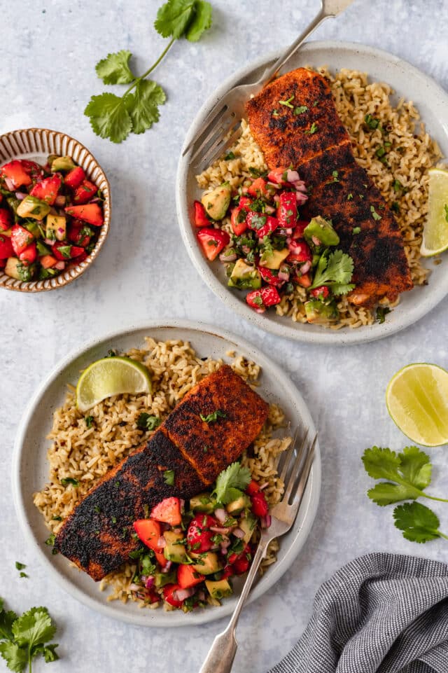 blackened salmon served with strawberry salsa over rice