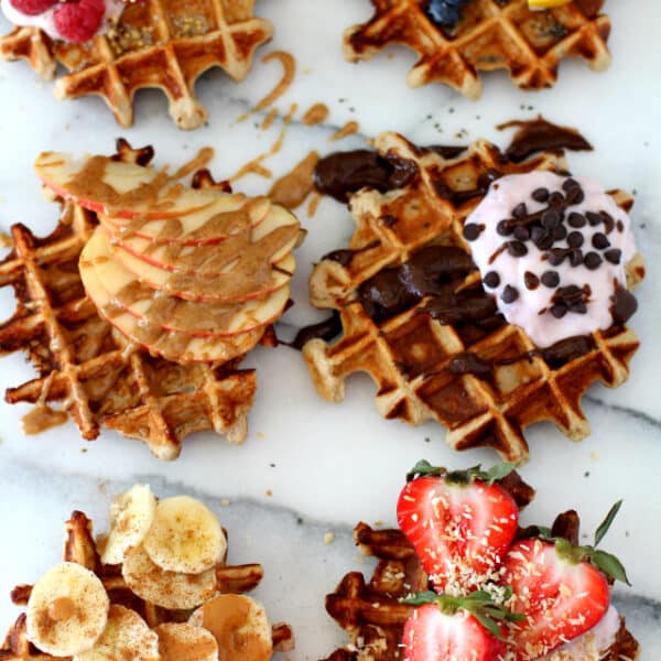 The best-ever fluffy yogurt protein waffles require just 4 ingredients, 10 minutes and 1 bowl. They are thick, soft, perfectly sweet, buttery and perfect! Made naturally gluten-free, so just about everyone can enjoy!