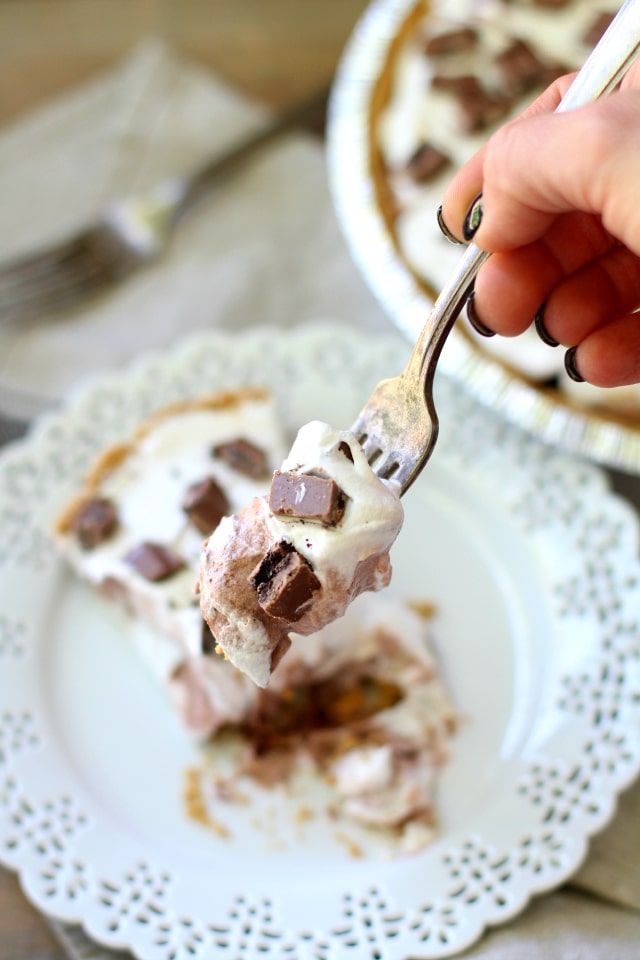 One bite of this decadent Chocolate Candy Bar Pudding Pie and you won't be able to stop!