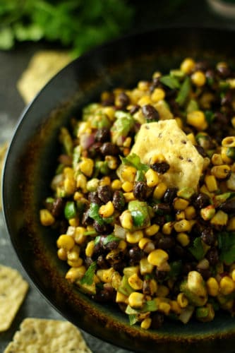 This Corn Black Bean Avocado Salsa is everything I love – sweet, savory, spicy, crunchy and fresh. Heaven in a dip, I say. Your summer’s about to get way more legit.