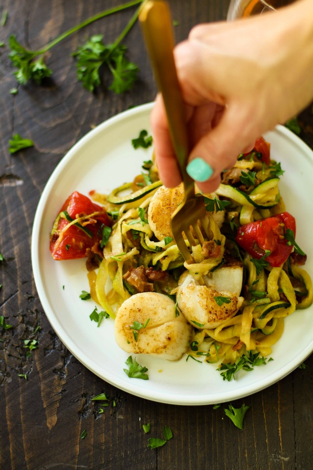 The absolute most perfect date night meal - Seared Scallops with Bacon Zucchini Noodles. It's a little bit of fancy with a huge amount of flavor and so super easy to cook up. You and your sweetheart will go ga-ga over this healthy, cozy meal! 