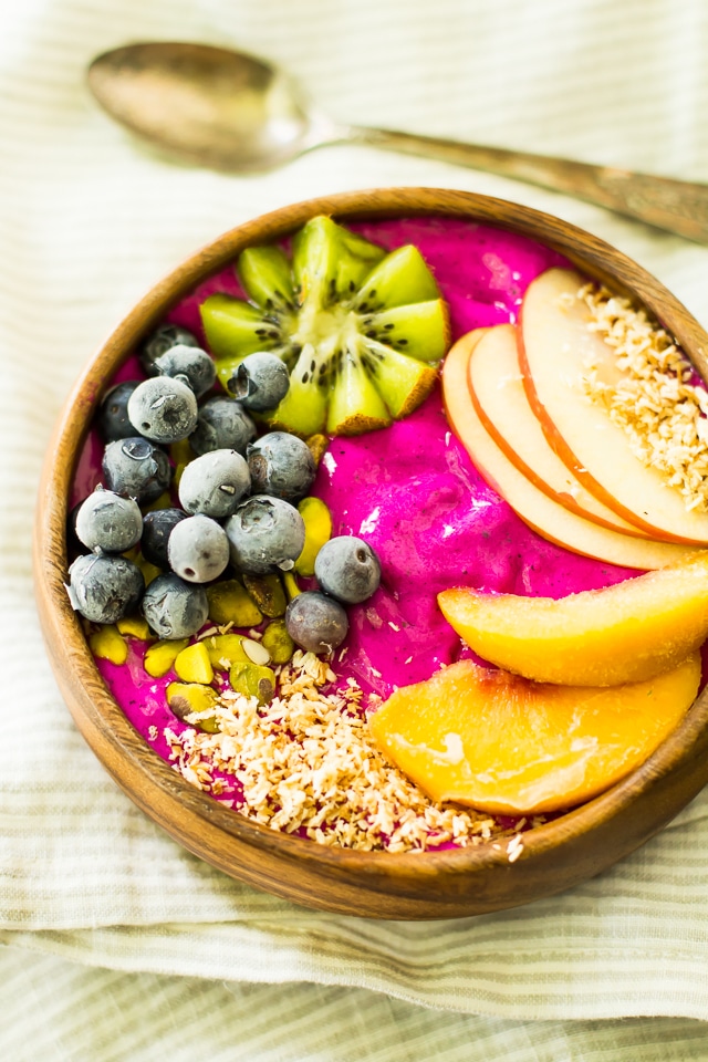 Gorgeous, healthy morning fuel! Pitaya Peach Power Smoothie Bowl is loaded with antioxidants, protein, and fresh flavor. Dairy free and easy to make!