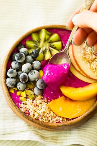 Gorgeous, healthy morning fuel! Pitaya Peach Power Smoothie Bowl is loaded with antioxidants, protein, and fresh flavor. Dairy free and easy to make!