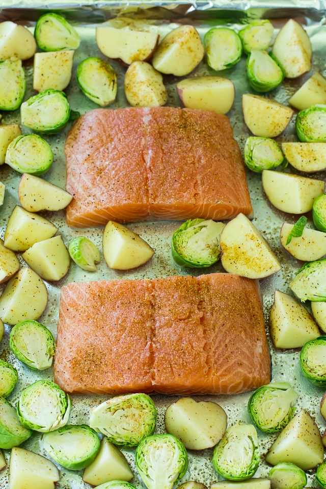 This one pan cajun salmon is super juicy with just kick of spice and gets topped off with a tangy hit of pineapple salsa. All made on one tray and ready in 30 minutes.