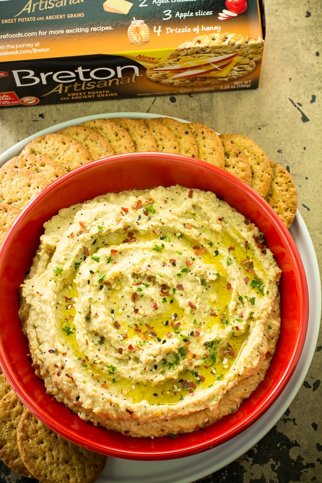 Easy 10 minute Super Flavorful Ranch Hummus is so creamy dreamy irresistibly delicious. And I'm warning you, it's quite addictive!! Not only is this an amazing and easy dip, it works fantastic as a spread for a sandwich or roll-up as well.