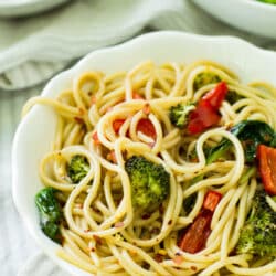 This Roasted Veggie Spinach Pasta features loads of spinach and roasted vegetables tossed with a light balsamic sauce and served over my favorite Skinner® pasta!
