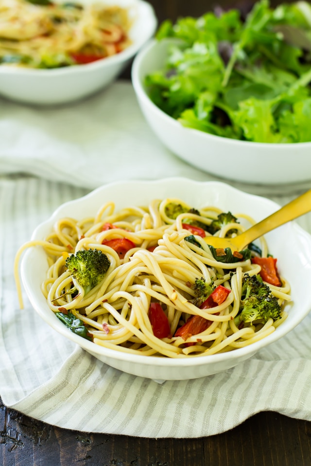 This Roasted Veggie Spinach Pasta features loads of spinach and roasted vegetables tossed with a light balsamic sauce and served over my favorite Skinner® pasta! 