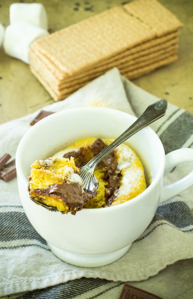 Quick, easy, and campfire-free, this single-serve Gluten Free S'mores Mug Cake is the perfect way to enjoy the delicious flavors of summer in a soft and doughy muffin-like form.