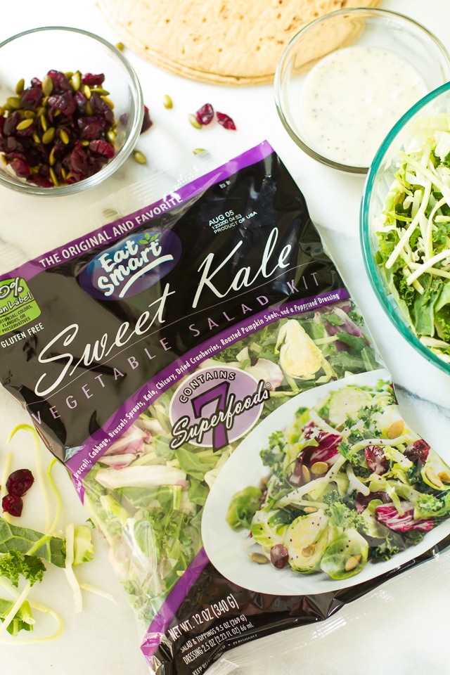 Take your sandwiches and wraps up a notch with these fully loaded Sweet Kale Vegetable Salad Wraps! Packed with fresh vegetables, dried cranberries, roasted pumpkin seeds and a delicious poppyseed dressing, these low calorie, high flavor wraps are the perfect vegetarian and gluten-free lunch or dinner!