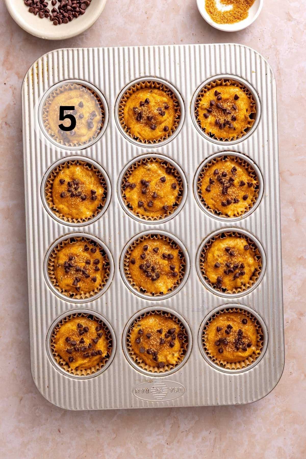 Muffin batter in a muffin pan.