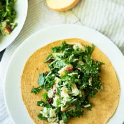 Autumn Kale Chicken Salad features apple, avocado and almonds in this delicious fall salad recipe. Serve this easy salad in a wrap for a yummy lunch!