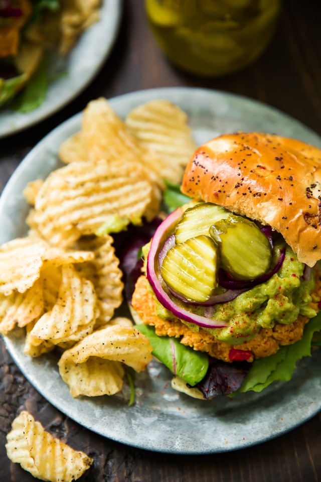 These ridiculously healthy, flavorful Sweet Potato Veggie Burgers feature sweet potato, chickpeas, and southwest seasonings! Gluten free optional and easy to make.