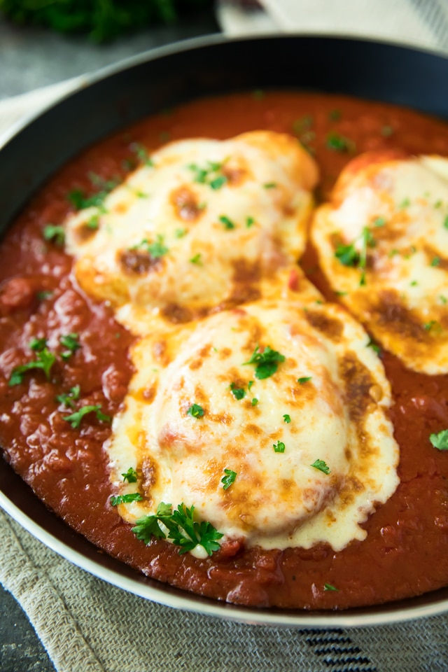This 15 Minute Mozzarella Chicken Skillet is quick, cheesy, saucy and so delicious. One dish you definitely don't want to miss! 