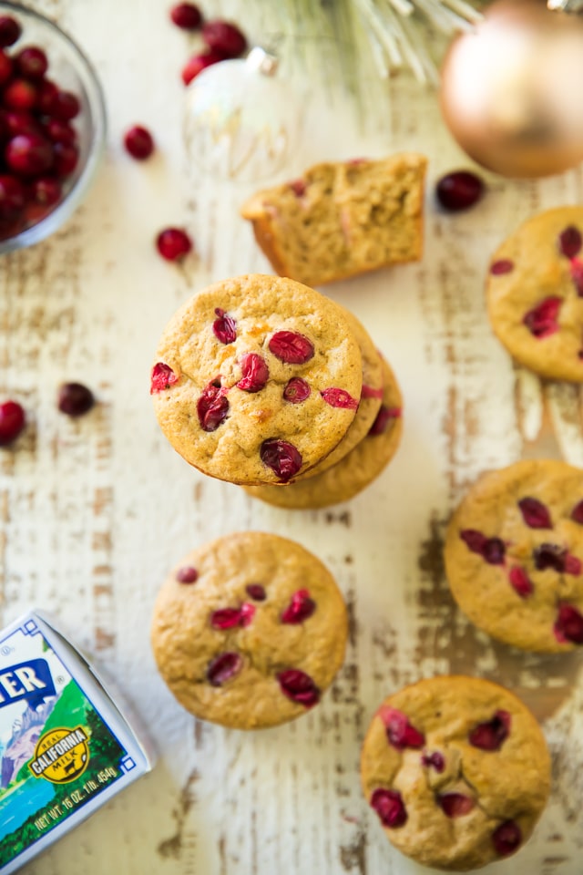 Cranberry Apple Muscle Muffins have a festive burst of flavor and plenty of protein to power your day of gifting!