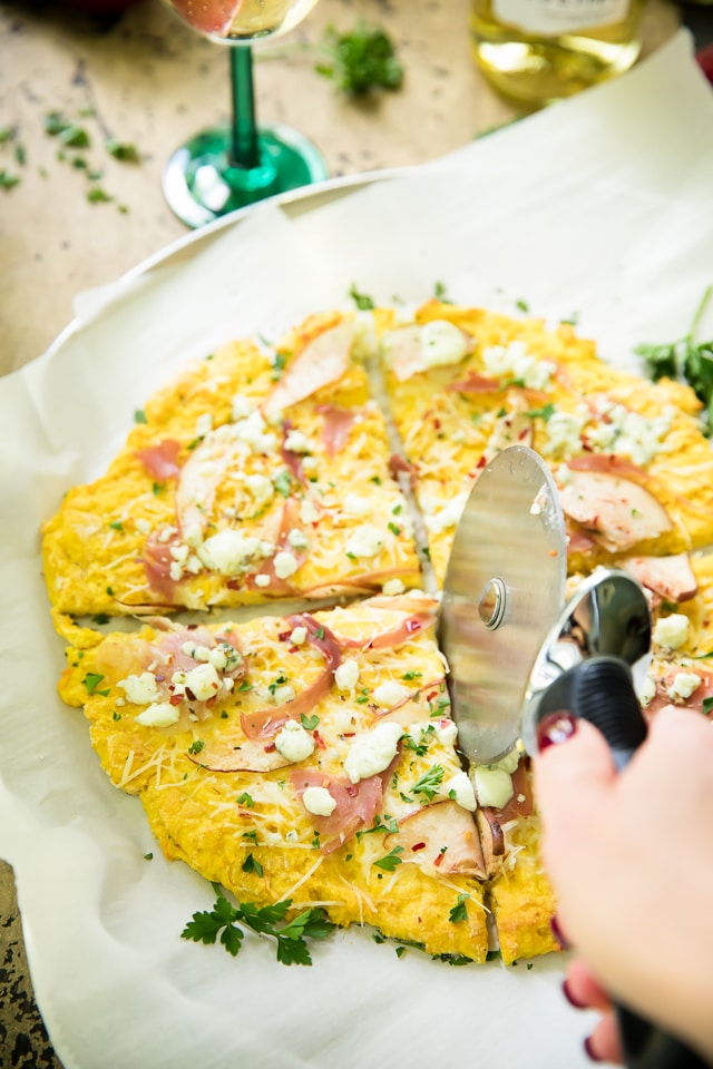 This Pear, Gorgonzola and Prosciutto Flatbread is the most perfect combination of flavors for serving this time of year. A crowd-pleasing, simple, flavorful flatbread-style pizza I'll be cooking up for all of my holiday gatherings!