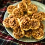 These Pecan Pie Tarts have been a family favorite for as long as I can remember. They're the BEST treat to enjoy and give during the holiday season. Perfectly sweet, with an ooey gooey center and flaky melt in your mouth buttery crust. Your family and friends are sure to love this dessert!  