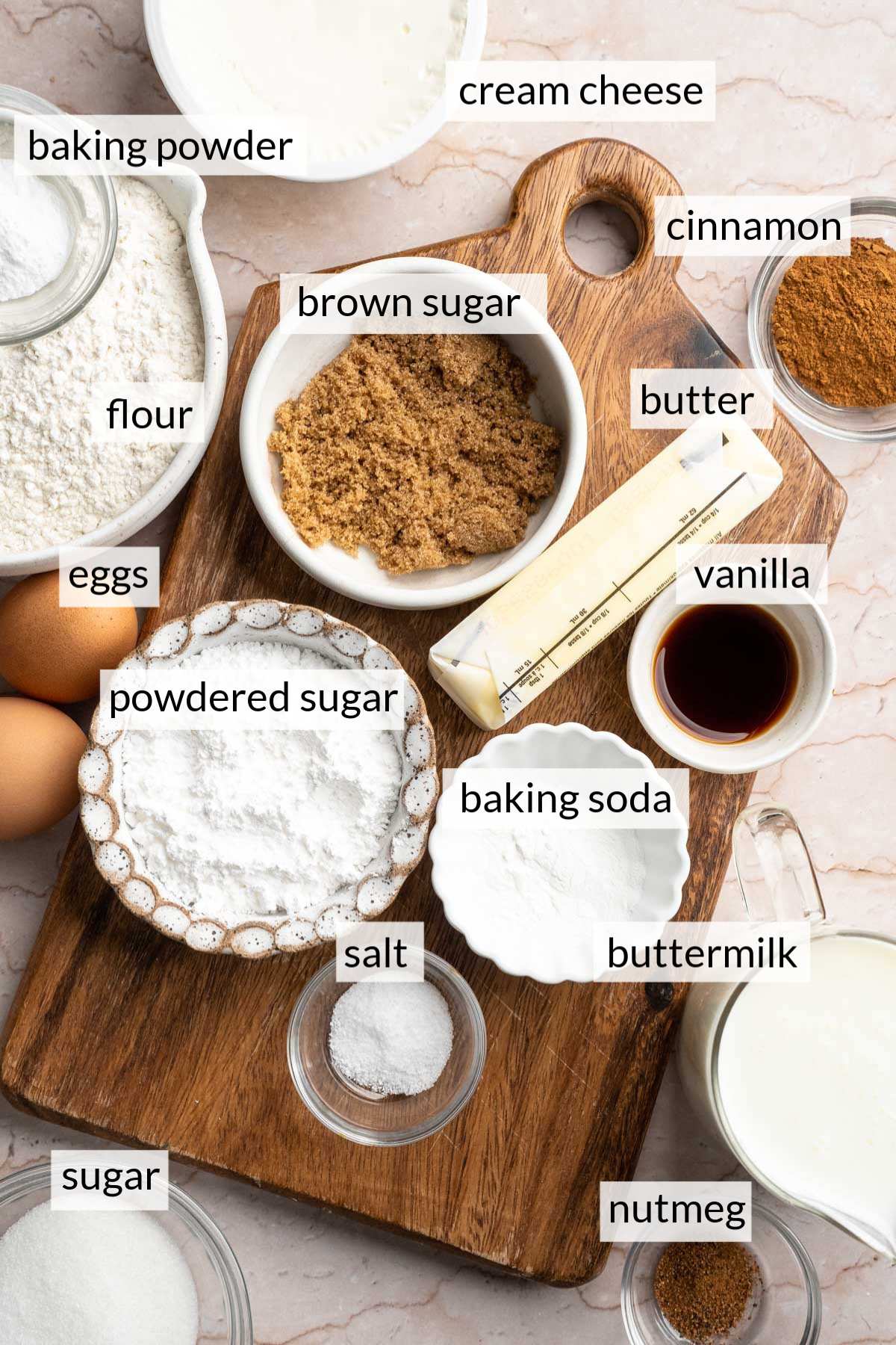 Small bowls with sugar, flour, vanilla, cinnamon and buttermilk.