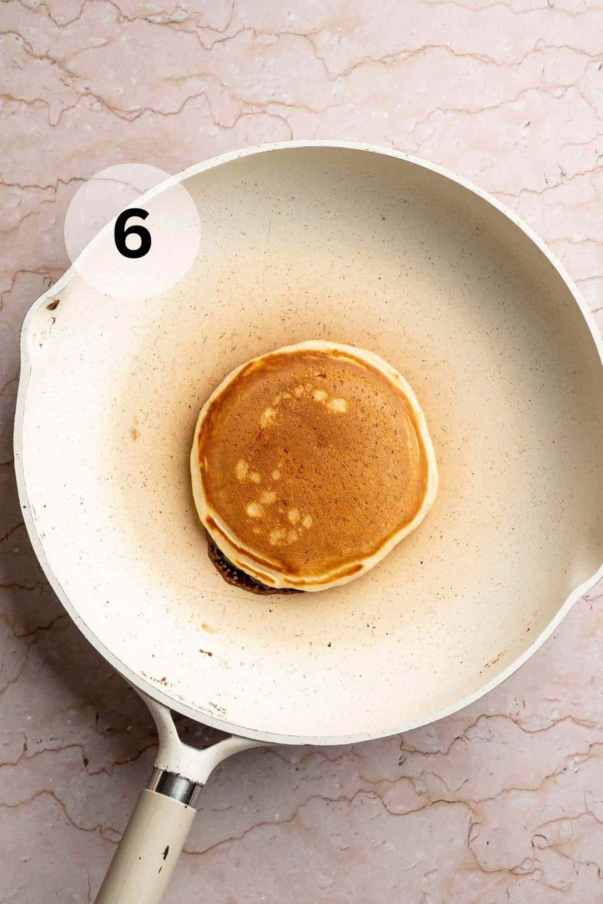 Golden pancake in a skillet.